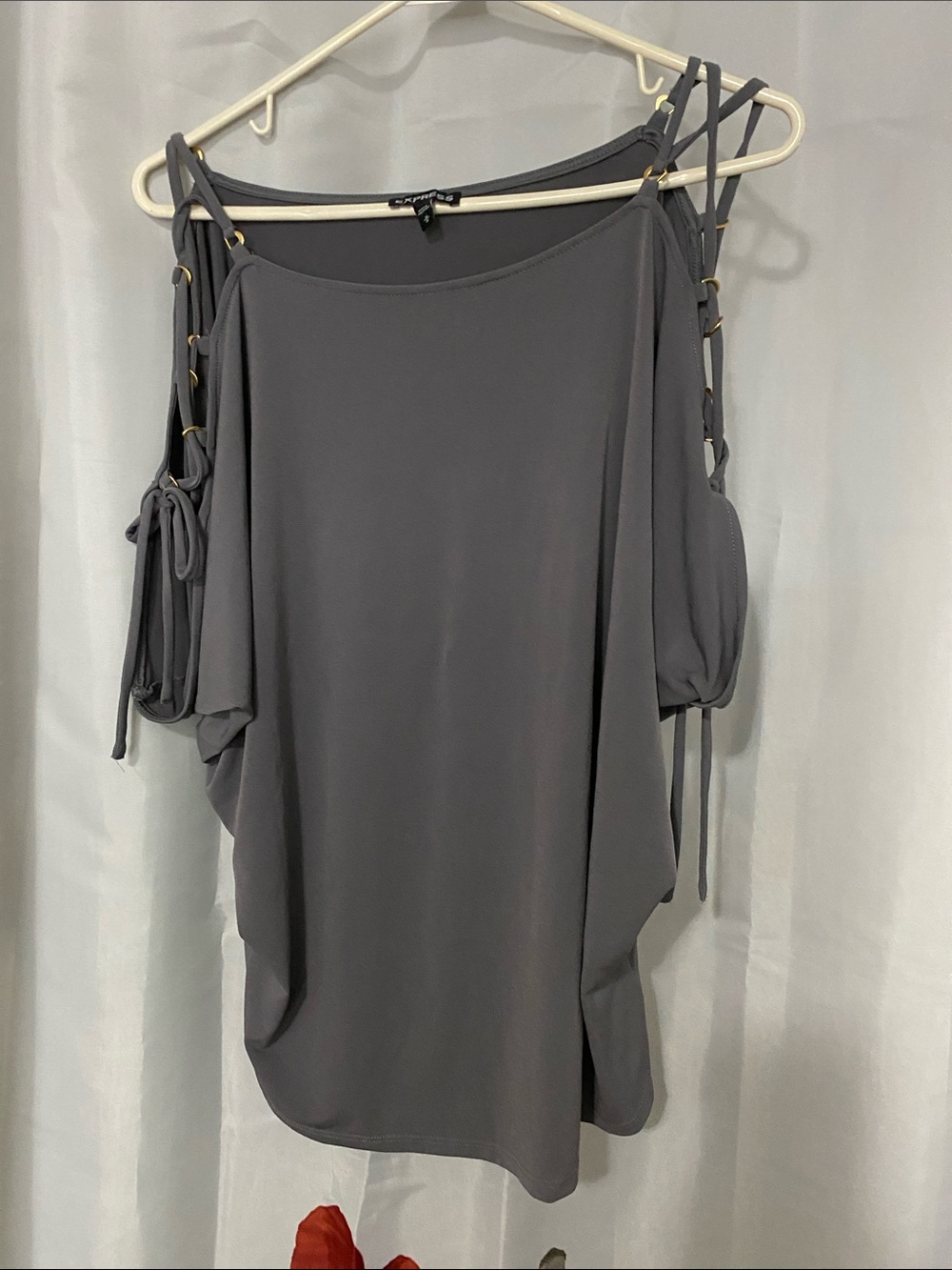 Short Sleeve Top With Lace Up Sleeves.